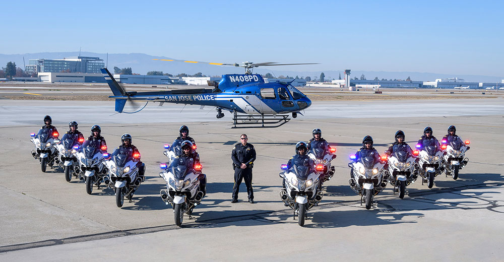 SJPD Motors Unit - Motorcycle Officers pictured with helicopter