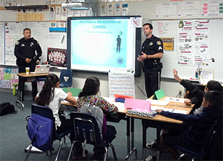 officers in classroom