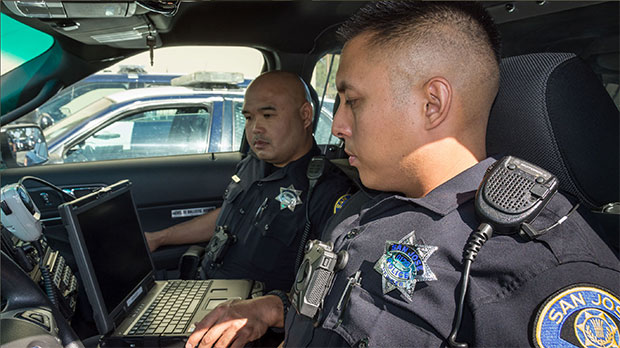 officers in a car